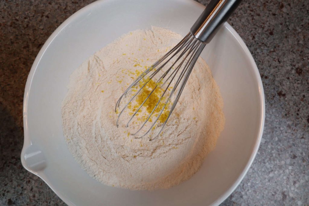 Bowl with dry ingredients for blueberry muffins