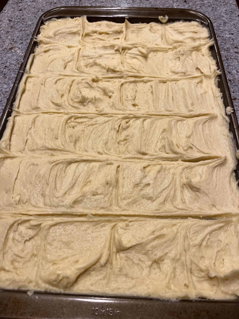 Cherry Holiday Squares before baking, with the squares marked out.