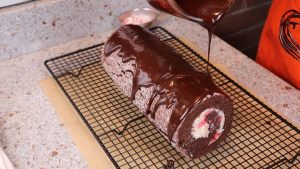 Pour the ganache over the top of the chocolate peppermint roll cake recipe.