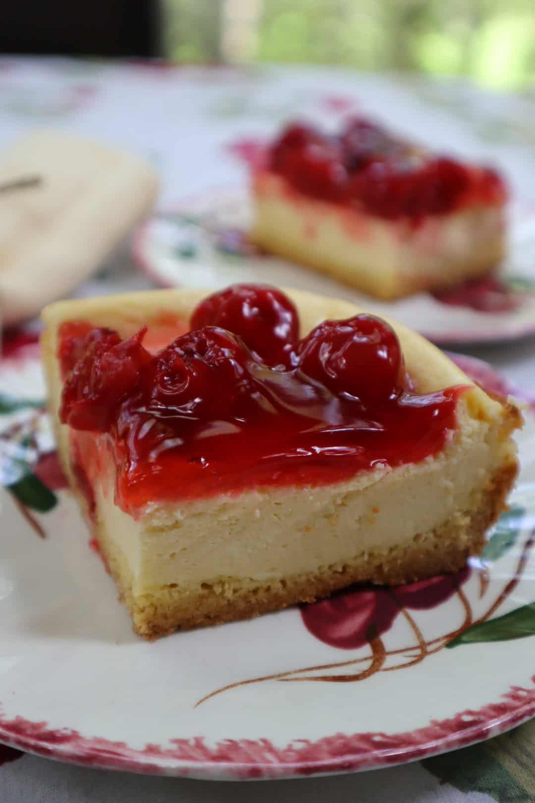 Slice of Simple Cherry Cheesecake.